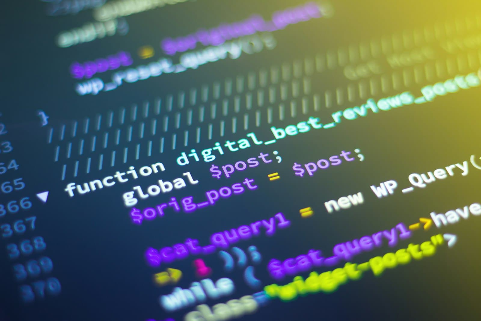 Developer reviewing security-related code on a laptop